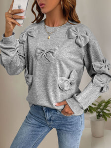 Perfee Bow Round Neck Long Sleeve Sweatshirt Trendsi